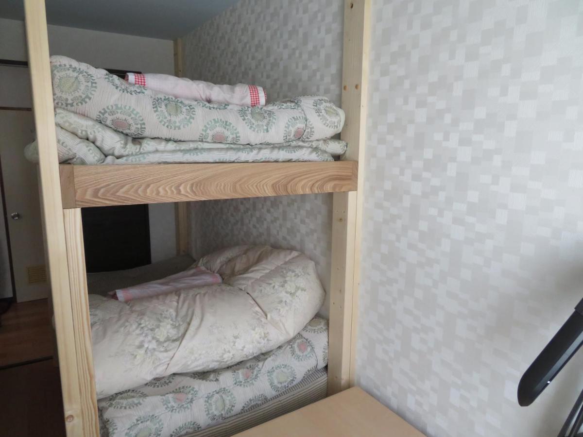 Sapporo Guest House Nariya Bagian luar foto