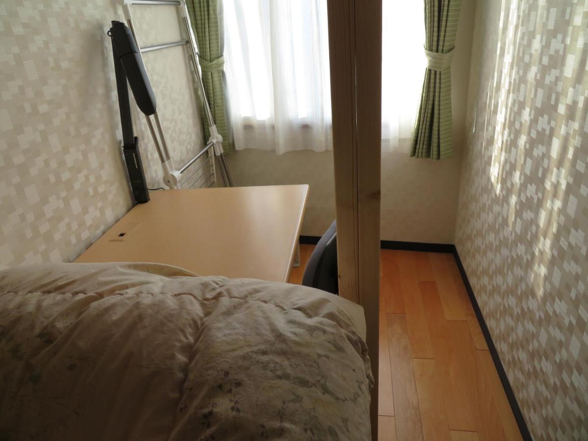 Sapporo Guest House Nariya Bagian luar foto