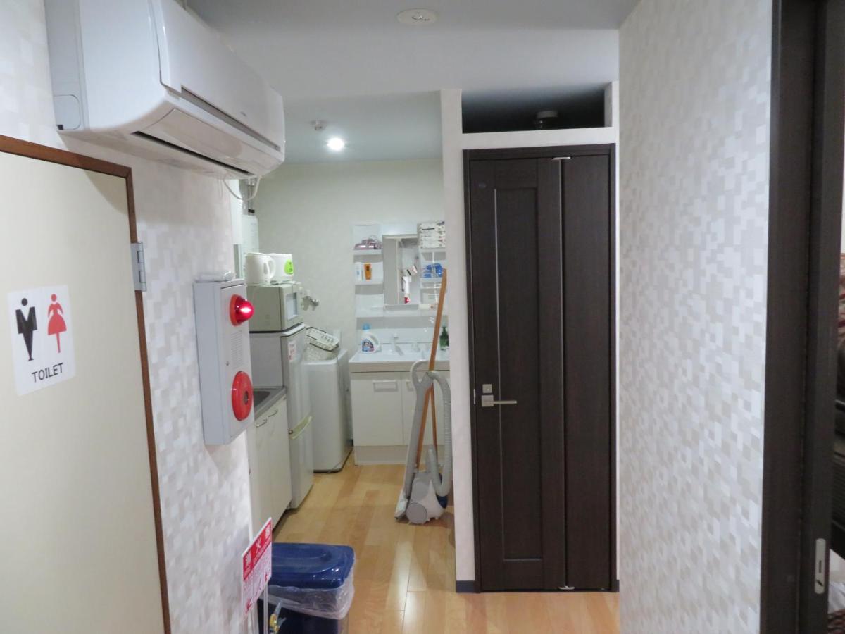 Sapporo Guest House Nariya Bagian luar foto