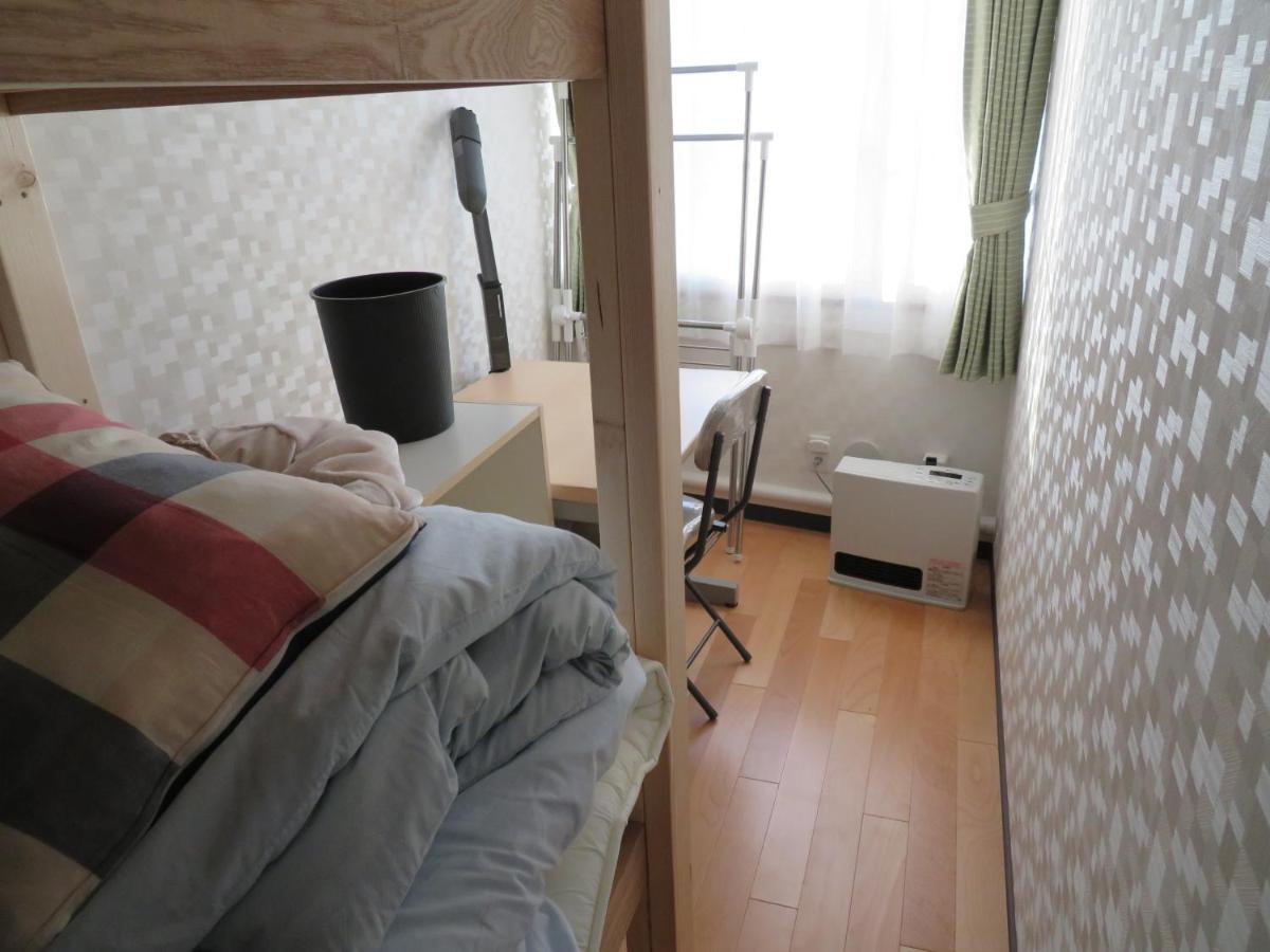 Sapporo Guest House Nariya Bagian luar foto