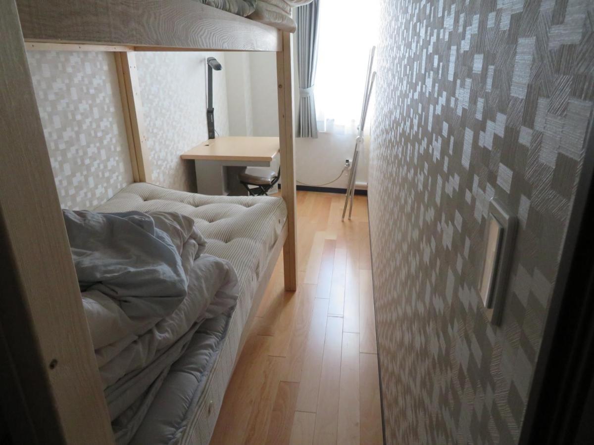 Sapporo Guest House Nariya Bagian luar foto