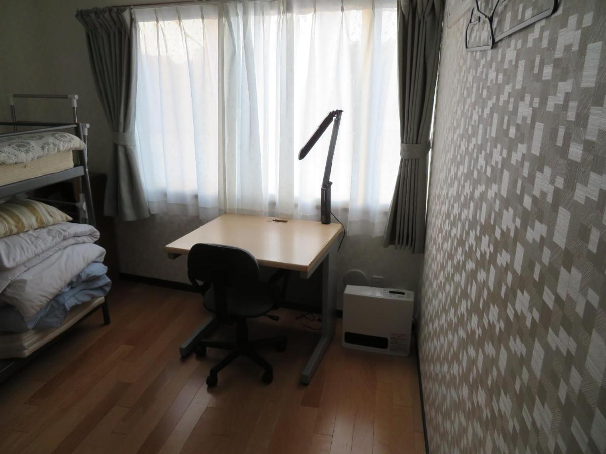 Sapporo Guest House Nariya Bagian luar foto