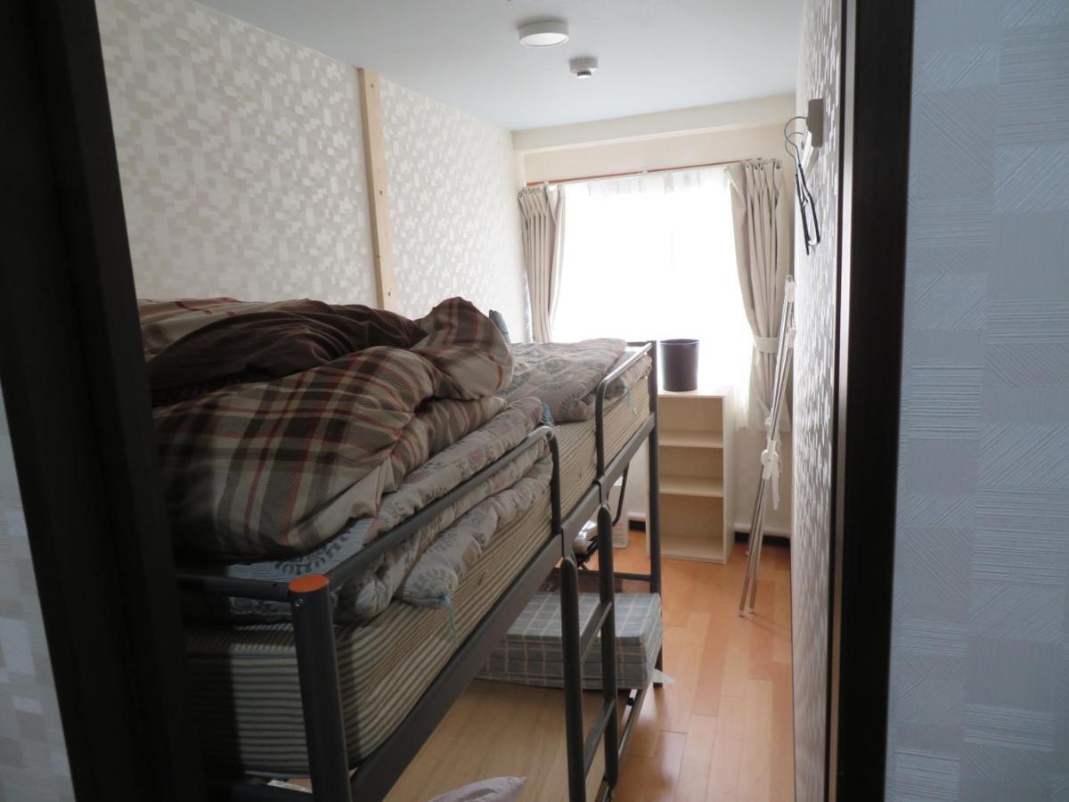 Sapporo Guest House Nariya Bagian luar foto