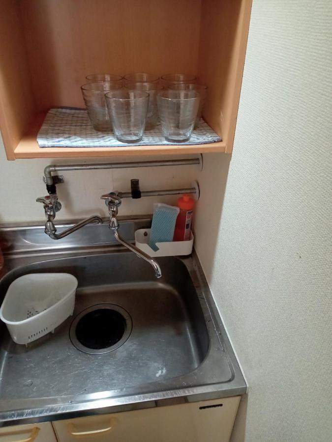 Sapporo Guest House Nariya Bagian luar foto