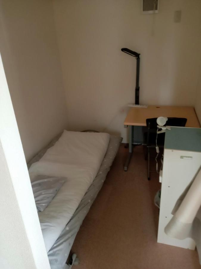 Sapporo Guest House Nariya Bagian luar foto