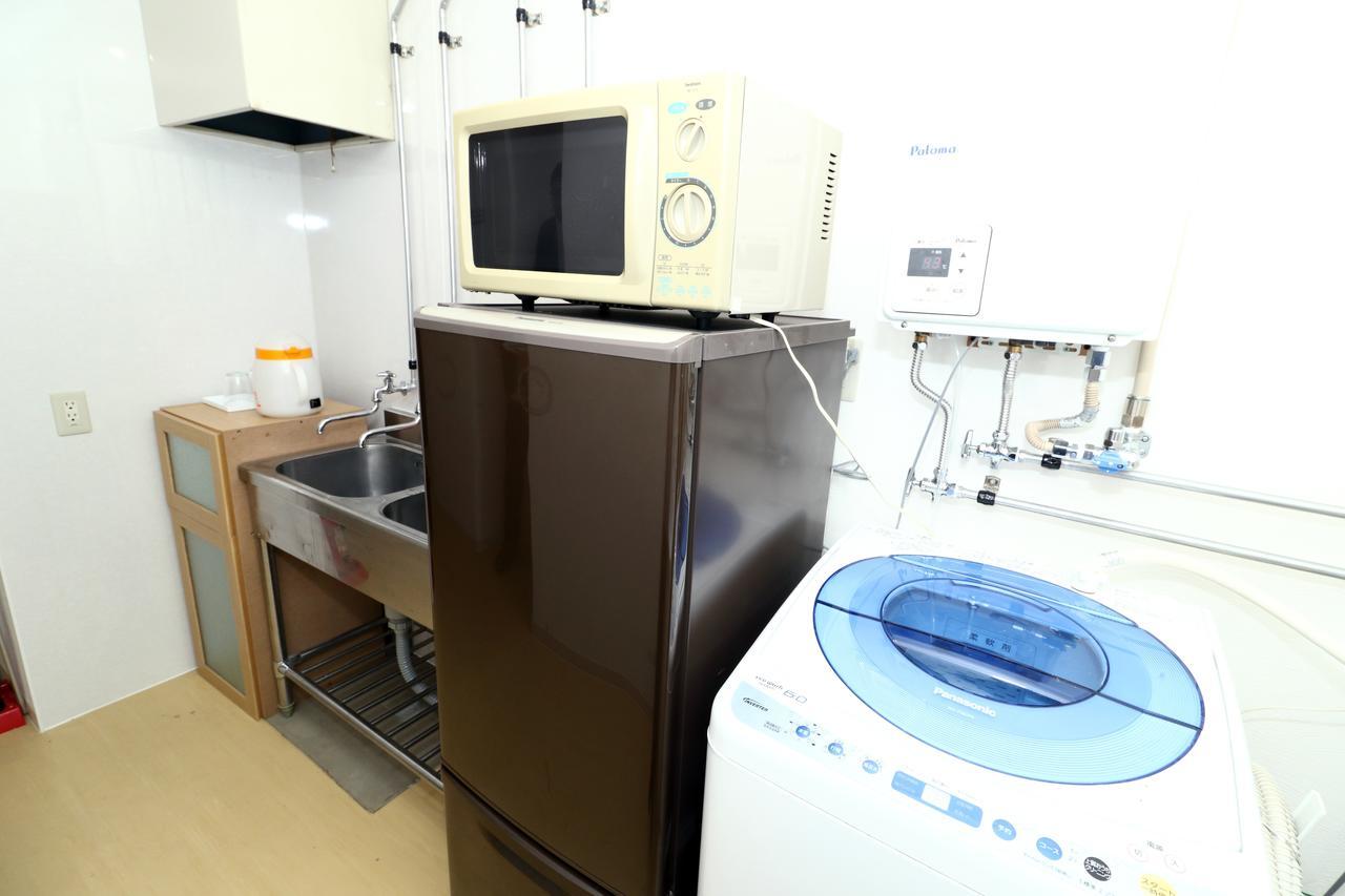 Sapporo Guest House Nariya Bagian luar foto